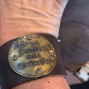 Custom made leather cuff with brass saying